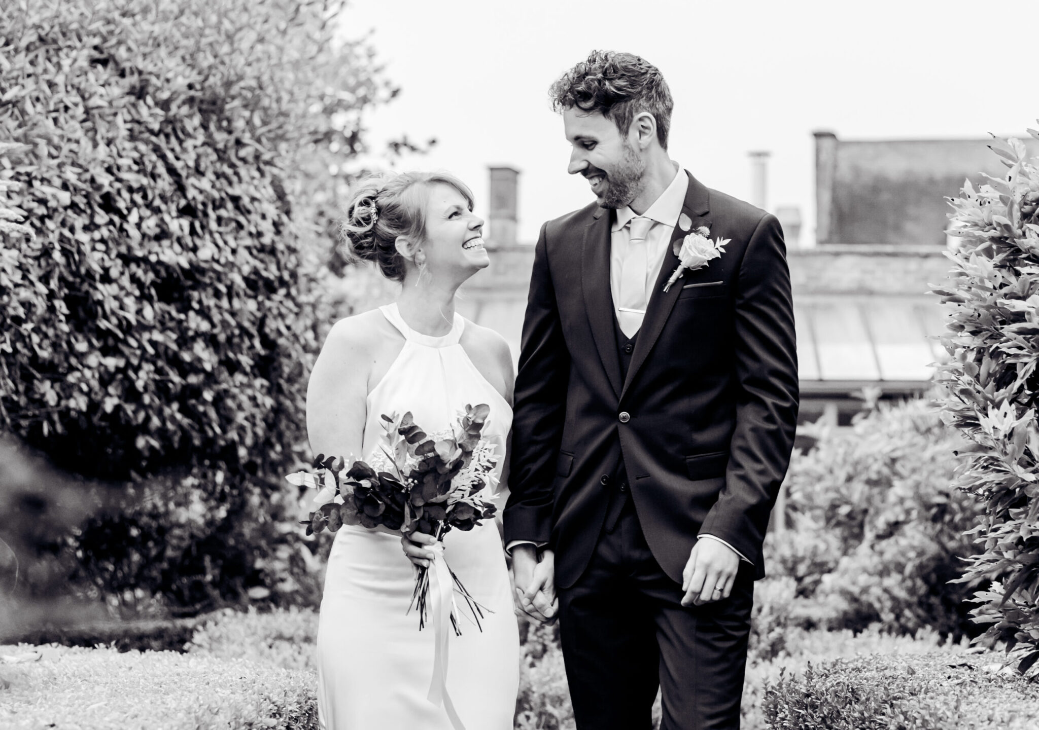 bride and groom in gardens at manor house moreton